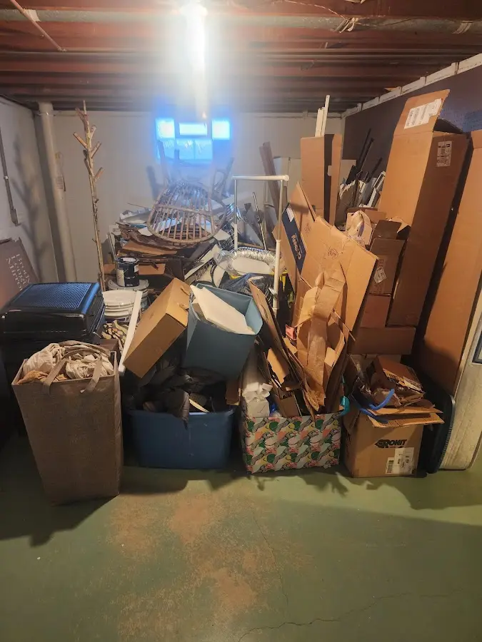 Roll-off dumpster container at job site for 20 Yard Dumpster Rental in Matthews